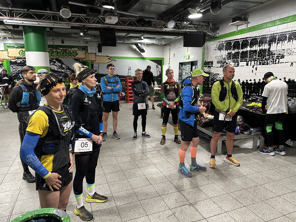 We handed out bib numbers, GPS trackers, shirts, and received drop bags and finish line bags and gave this final race briefing for everyone