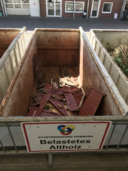 Old red shed goes in the recycling container