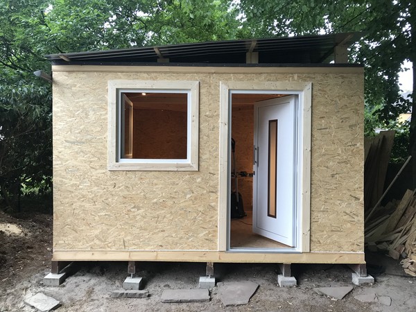 Some frames around the outside of the window and door, and some silicone to seal that off for rainy days to come