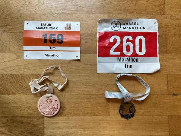 Two races – two bibs and two medals