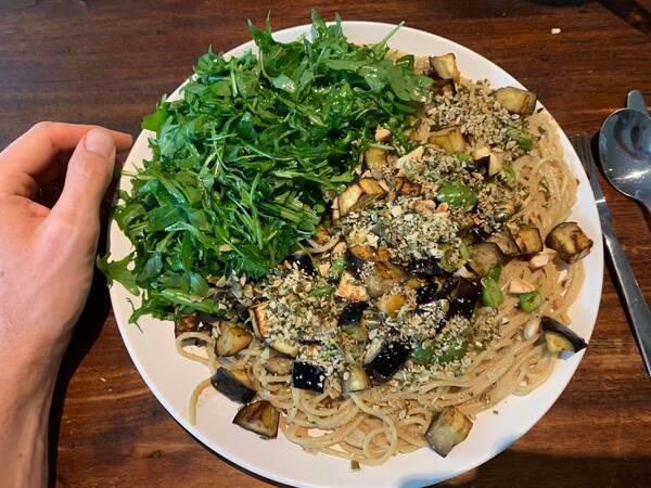 It’s a relief that pasta is without animal products by default – rocket, eggplant, roasted cashews on top and it makes for great carbo-loading