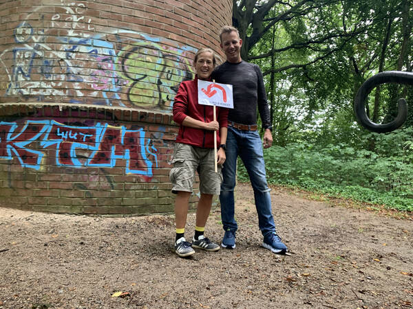 Antje and Flo with the top turning point sign I painted