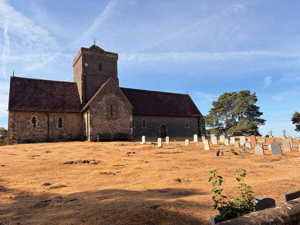 Apart from the brown meadow, this graveyard looks very England-like to me