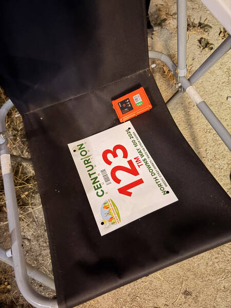 Tracker and bib on the last chair