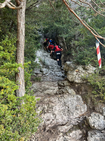 Vertical stony climb, still crowded