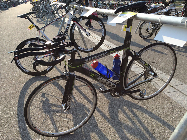 My bike hanging on the rack in the evening