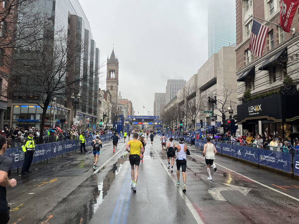 Running towards the rainy Boston finish line on Boylston Street