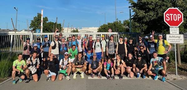 In front of the closed gates of the brewery