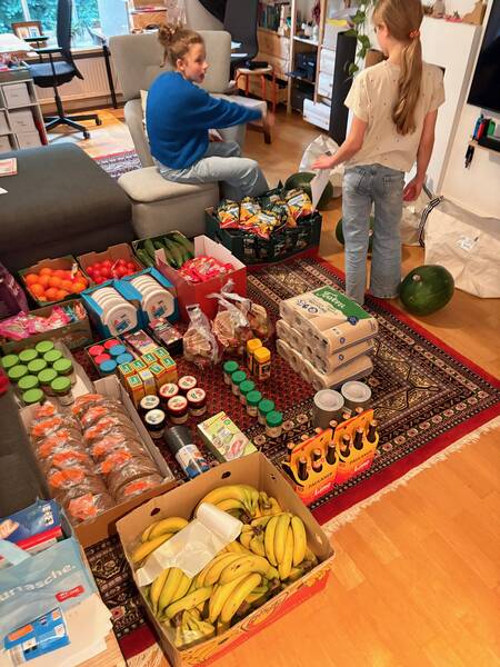 Sorting out parts of the food with help from some of my daughters