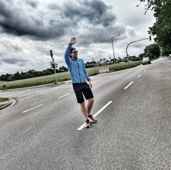 Me waving the runners goodbye after leading them to cross the street