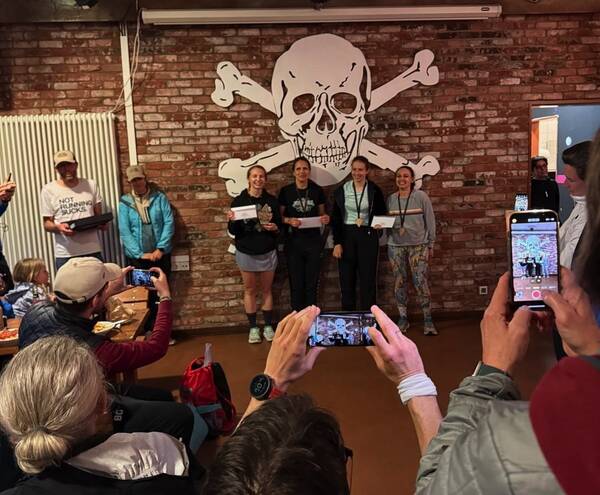 And the fastest three 100k ladies, because places three and four arrived simultaneously