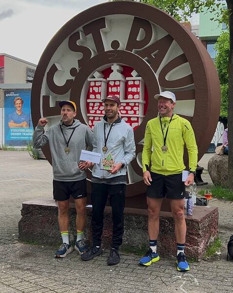 The fastest three males in the 100k