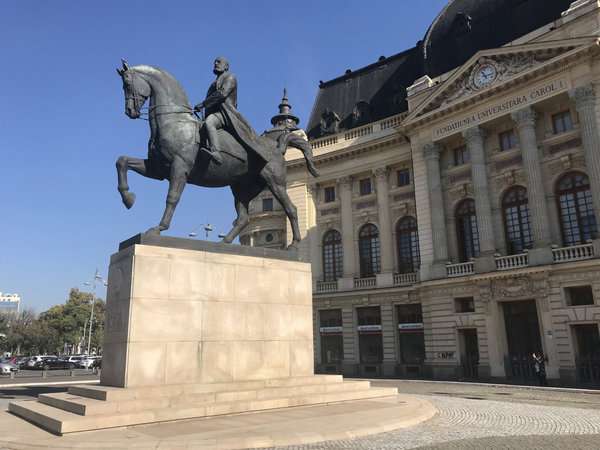 A horse statue with one leg in the air