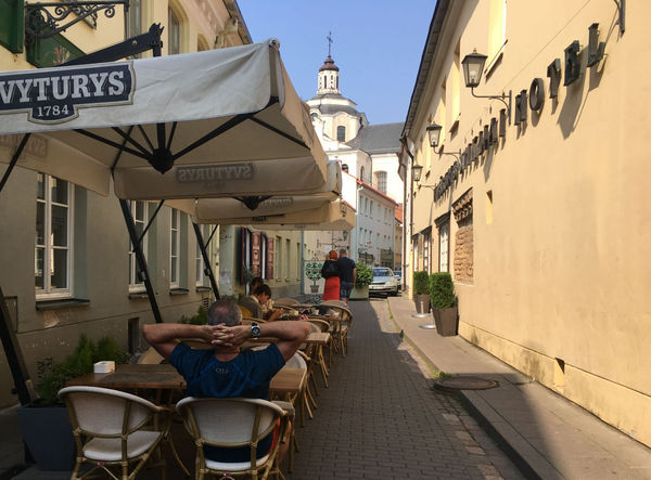 Many cafés just block the road with their tables. Cafés > Cars.